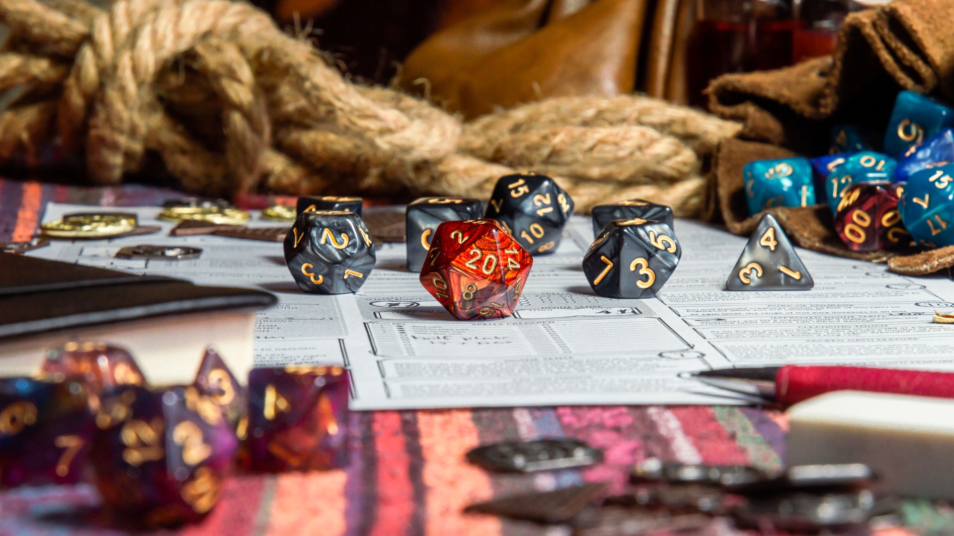 Table top view of Roleplaying Game Dice And Character Sheets